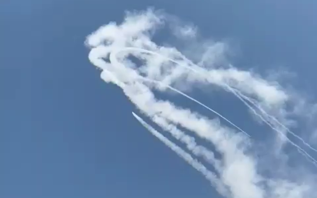 Iron Dome interceptor missiles are seen over the Golan Heights, as over 10 rockets were fired from southern Lebanon on August 6, 2021. (Video screenshot)