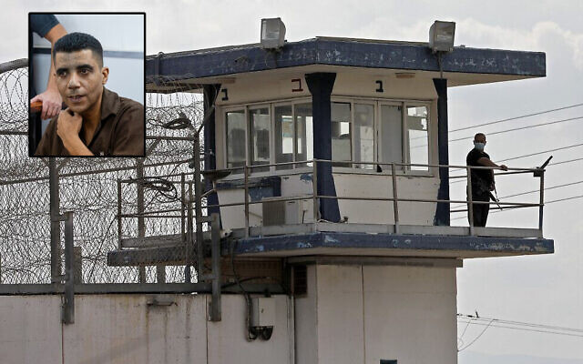 A guard keeps watch from an observation tower at Gilboa Prison in northern Israel on September 6, 2021, after the escape of six Palestinian security prisoners from the facility. (Jalaa Marey/AFP) Photo of terrorist leader Zakaria Zubeidi. (Yonatan Sindel/Flash90)