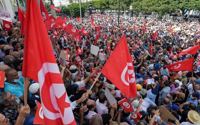 Demonstrators chant slogans during a protest in Tunisia's capital Tunis, on September 26, 2021, against President Kais Saied's recent steps to tighten his grip on power. (Fethi Belaid/AFP)