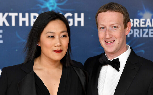 Priscilla Chan and Mark Zuckerberg attend the 2020 Breakthrough Prize Red Carpet at NASA Ames Research Center on November 03, 2019 in Mountain View, California. (Ian Tuttle/Getty Images  for Breakthrough Prize/JTA)