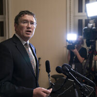 In this Tuesday, May 28, 2019 file photo, Rep. Thomas Massie, R-Ky., speaks to reporters at the Capitol after he blocked a unanimous consent vote on a long-awaited $19 billion disaster aid bill in the chamber. (AP Photo/J. Scott Applewhite, File)