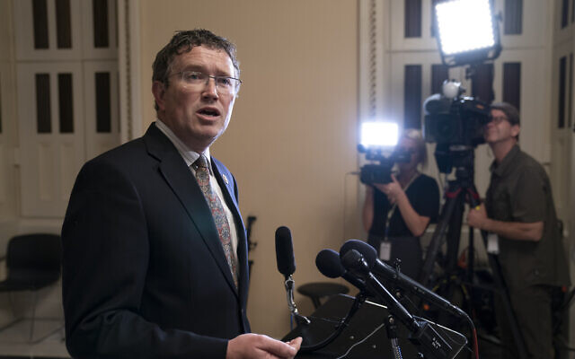 In this Tuesday, May 28, 2019 file photo, Rep. Thomas Massie, R-Ky., speaks to reporters at the Capitol after he blocked a unanimous consent vote on a long-awaited $19 billion disaster aid bill in the chamber. (AP Photo/J. Scott Applewhite, File)