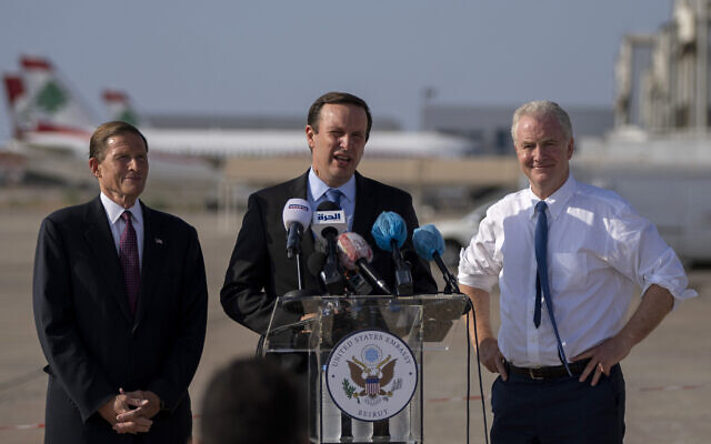 Sen. Chris Murphy, D-C.T., center, Sen. Chris Van Hollen, D-Md., right, and Sen. Richard Blumenthal, D-C.T., hold a press conference at the military airbase in Beirut airport, Lebanon, Wednesday, Sept. 1, 2021. A delegation of four U.S. senators visiting Lebanon promised to work on easing Lebanon's crippling economic crisis.  They later traveled to Israel and Tunisia. (AP Photo/ Hassan Ammar)