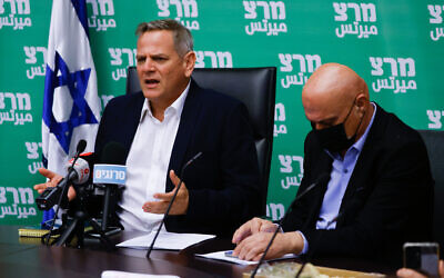 Health Minister Nitzan Horowitz, left, and Minister for Regional Cooperation Issawi Frej, right attend a Meretz faction meeting at the Knesset, in Jerusalem, on July 12, 2021. (Olivier Fitoussi/Flash90)