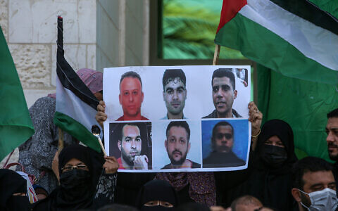 Palestinians attends a rally in solidarity to the escape of the six Palestinian prisoners from the Israeli prison of Gilboa on September 8, 2021, in Khan Yunis in the southern Gaza Strip. (Abed Rahim Khatib/Flash90)