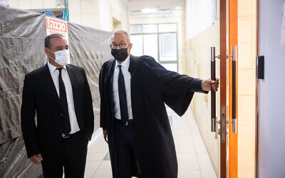 Former prime minister Benajmin Netanyahu's attorney Boaz Ben Tzur (R) and lawyer Jack Chen arrive at the Jerusalem District Court for a court hearing, September 29, 2021. (Yonatan Sindel/Flash90)