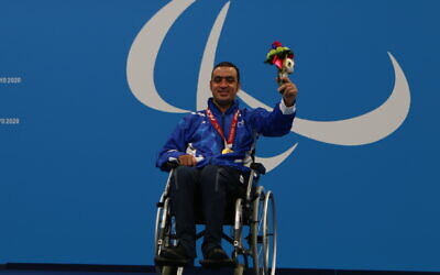 Israeli Paralympic swimmer Iyad Shalabi receives his second gold medal in Tokyo on September 2, 2021. (Keren Isaacson/IPC)