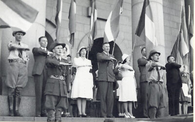 Members of the South African pro-German group the Ossewabrandwag perform their salute in this undated photo from circa WWII. (Courtesy OB Archive, North-West University, South Africa)