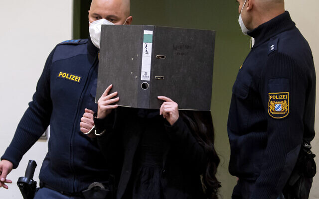 Defendant Jennifer W. arrives in a courtroom for her trial in Munich, Germany, Oct. 25, 2021 (Sven Hoppe/dpa via AP)