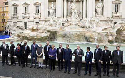 Leaders of the G20 pose for a photo by the Trevi Fountain during an event for the G20 summit in Rome, October 31, 2021, laying the groundwork for the climate conference opening the same day in Glasgow. (Jeff J Mitchell/Pool Photo via AP)