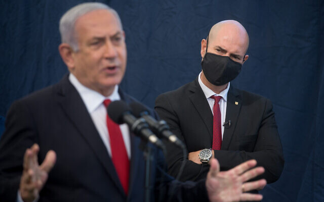 Then-prime minister Benjamin Netanyahu and then-public security minister Amir Ohana in Tel Aviv, on December 1, 2020. (Miriam Alster/Flash90)