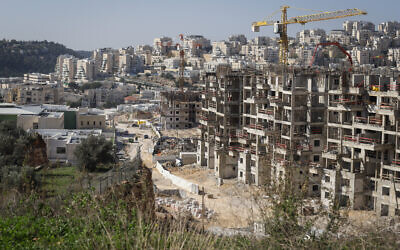 Construction work for new housing in the settlement of Modi'in Illit. January 11, 2021. (Flash90)