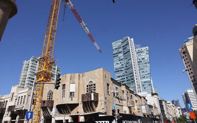 Old structures mix with luxury buildings around Rothschild Boulevard in Tel Aviv, September 8, 2021. (Nati Shohat/FLASH90)