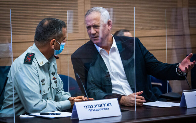 IDF Chief of Staff Aviv Kochavi (L) and Defense Minister Benny Gantz attend a Knesset Foreign Affairs and Defese Committee meeting on October 19, 2021. (Yonatan Sindel/Flash90)