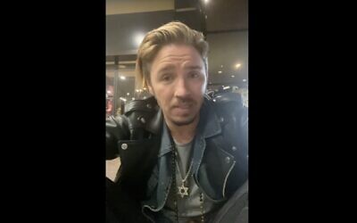 Screen capture from video of Gil Ofarim, a German-Israeli singer, explaining how he had been denied a hotel room in Leipzig, Germany, because he was wearing a Star of David necklace. (Screenshot from Instagram video via JTA)