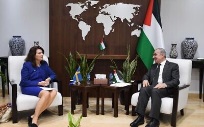 Swedish Foreign Minister Ann Linde meets with Palestinian Authority premier Mohammad Shtayyeh in Ramallah on Tuesday, October 19, 2021 (WAFA)