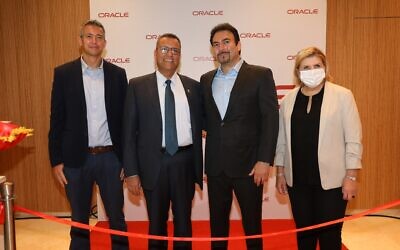 From left: Communications Minister Yoaz Hendel, Jerusalem Mayor Moshe Lion, Eran Feigenbaum, country manager, Oracle Israel, and Economy Minister Orna Barbivai attend the inauguration of Oracle's new cloud center region in Jerusalem, October 13, 2021. (Ezra Levy)