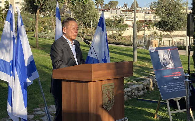 Nobuki Sugihara addresses participants at a ceremony in Jerusalem's Kiryat Yovel neighborhood dedicating Chiune Sugihara Square to his father, the WWII Japanese diplomat who saved thousands of Jews when serving as consul-general in Kovno, Lithuania. (Times of Israel)