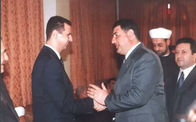 Midhat as-Saleh with Syrian President Bashar Assad (Kan Public Broadcaster screenshot)