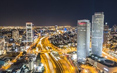 The Tel Aviv skyline at night. (Shai Pal on Unsplash)