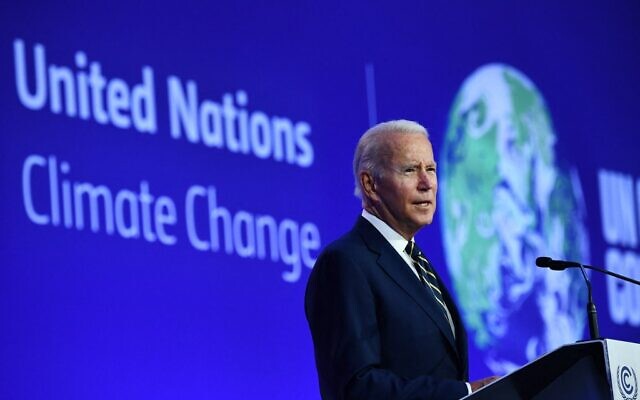 US President Joe Biden delivers a speech on stage during a meeting at the COP26 UN Climate Change Conference in Glasgow, Scotland, on November 1, 2021. (Photo by Brendan Smialowski / AFP)