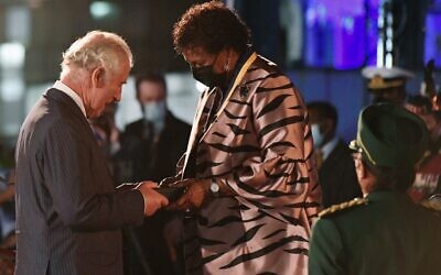 President of Barbados Dame Sandra Mason (R) awards Britain's Prince Charles the Order of Freedom of Barbados during the Presidential Inauguration Ceremony at Heroes Square on November 30, 2021 in Bridgetown, Barbados. (WPA POOL / GETTY IMAGES NORTH AMERICA / Getty Images via AFP)