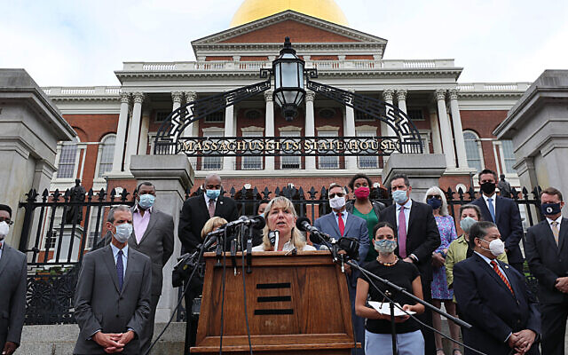 Massachusetts state Senate President Karen E. Spilka speaks on the steps of the State House in Boston on July 6, 2020. Spilka, who is Jewish, backed the Nov. 24, 2021, passage of a bill mandating genocide education in the state. (Suzanne Kreiter/The Boston Globe via Getty Images via JTA)
