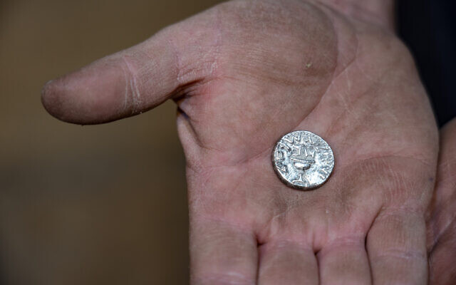 The rare silver coin (Yaniv Berman/City of David and the Israel Antiquities Authority)