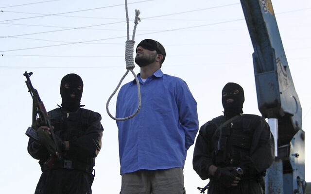 Illustrative: In this picture taken April 16, 2011, and released by the semi-official Mehr News Agency, a blindfolded man convicted of armed robbery, kidnapping and slaying of two policemen waits to be hanged in public. (AP Photo/Mohammad Hadi Khosravi)