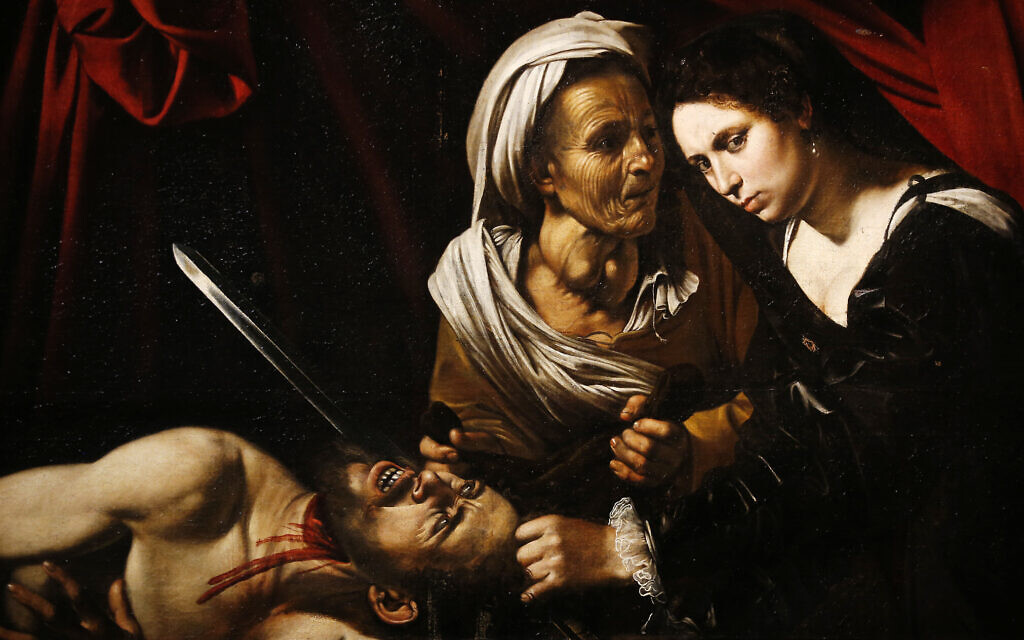 A painting believed to be the 'Judith Beheading Holofernes' by the Italian baroque master Michelangelo Merisi da Caravaggio is displayed at the Brera Gallery in Milan, Italy, םמ November 7, 2016. (AP Photo/Antonio Calanni)
