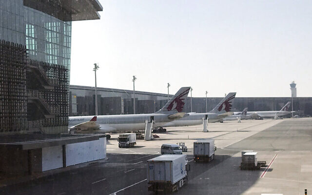 In this Friday, June 16, 2017 photo, Qatar Airways planes are seen parked at the Hamad International Airport in Doha, Qatar. (AP Photo/Malak Harb)