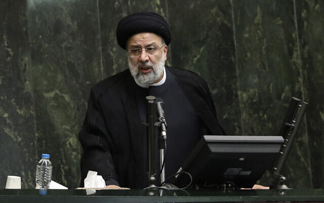 Iranian President Ebrahim Raisi addresses a session of parliament, in Tehran, Iran, August 25, 2021. (AP Photo/Vahid Salemi, File)
