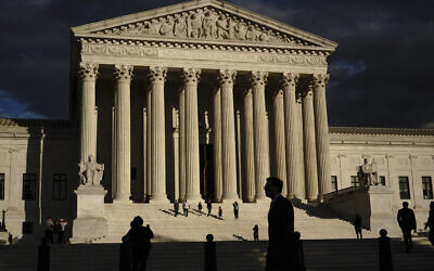 The US Supreme Court is seen at dusk in Washington, October 22, 2021. (J. Scott Applewhite/AP)