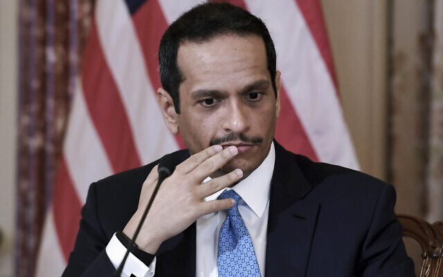 Qatar's Foreign Minister Sheikh Mohammed bin Abdulrahman Al-Thani looks on during a news conference with Secretary of State Antony Blinken following a signing ceremony at the State Department in Washington, Friday, Nov. 12, 2021. (Olivier Douliery/Pool via AP)