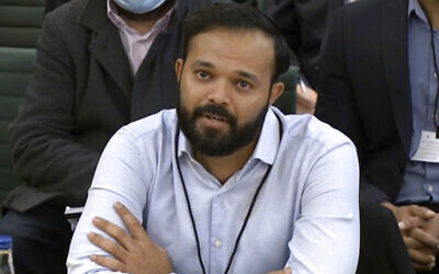 Former English cricketer Azeem Rafiq gives evidence during a parliamentary hearing at the Digital, Culture, Media and Sport (DCMS) committee on sport governance at Portcullis House in London, on November 16, 2021. (Video grab/House of Commons via AP)