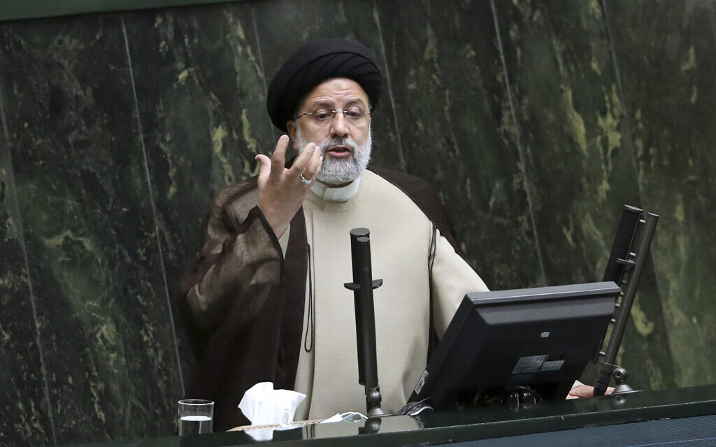 Iranian President Ebrahim Raisi addresses the parliament during a vote of confidence session for the education minister, in Tehran, Iran, Tuesday, Nov. 16, 2021.  Iran and world powers resume talks in Vienna this week of Nov. 28,  aimed at restoring the nuclear deal that crumbled after the U.S. pulled out three years ago. There are major doubts over whether the deal can be reinstated after years of mounting distrust.(AP Photo/Vahid Salemi)