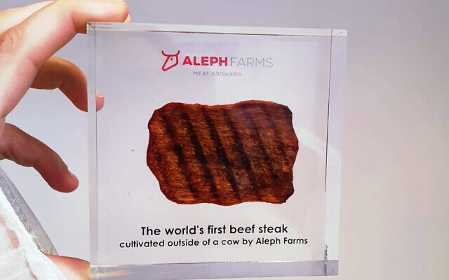An encased thin-cut, cultivated steak made by Israeli food tech startup Aleph Farms seen at the company's office in Rehovot, November 2021. (Times of Israel staff)