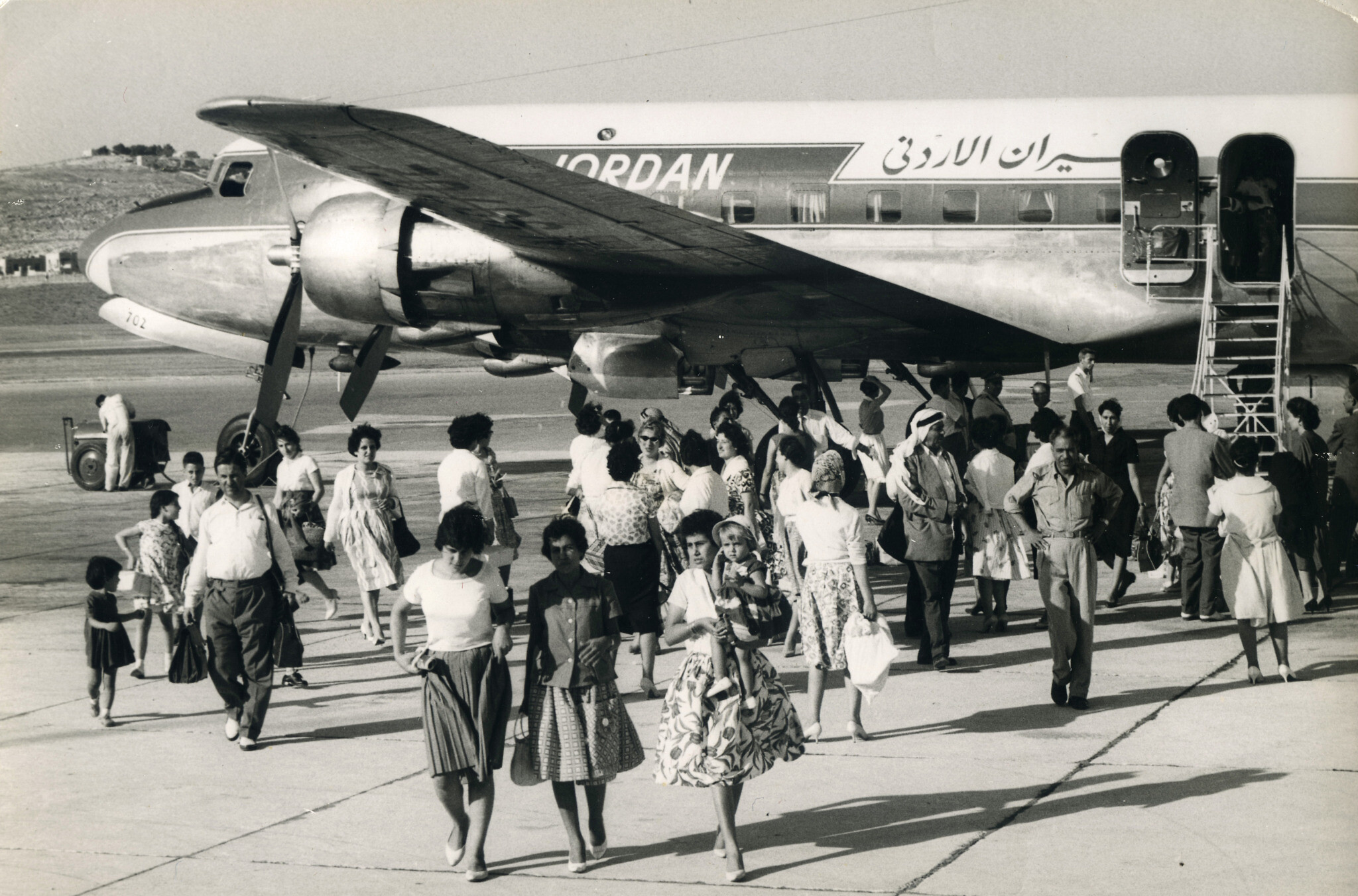 Pilgrims and other travelers arriving at Jerusalem Airport in the 1960s (Dr. Mohammed Al-Qutob Family Archive / From the exhibition "Gateway to the World: Jerusalem Airport 1948-1967")