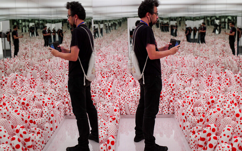 The sea of white and red phalluses at the Tel Aviv Museum of Art exhibition of Japanese artist Yayoi Kusama on October 31, 2021 (Photo by Tomer Neuberg/Flash90)