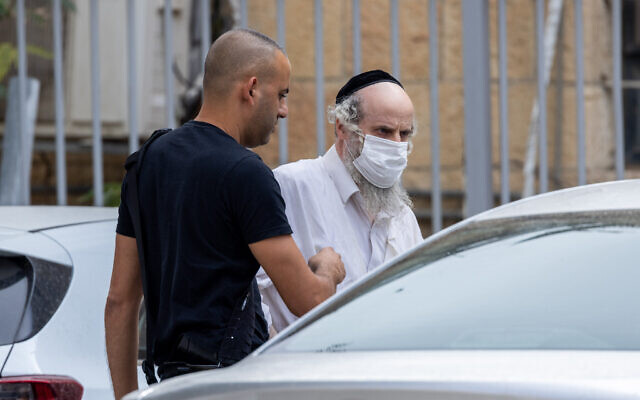 Tzvi Tzucker is seen outside the Jerusalem Magistrate's Court on November 1, 2021 (Yonatan Sindel/Flash90)