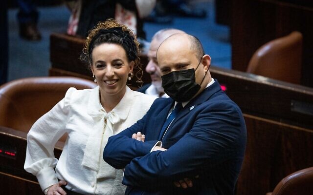 MK Idit Silman, the coalition chair, pictured with Prime Minister Naftali Bennett during voting in the Knesset on the state budget, November 4, 2021. (Yonatan Sindel/Flash90)