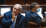 Opposition leader Benjamin Netanyahu (left) with Likud MK Yuli Edelstein in the Knesset on November 4, 2021. (Yonatan Sindel/Flash90)