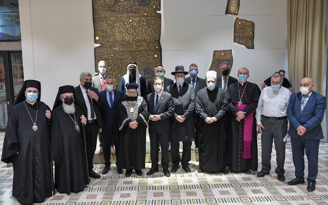 President Isaac Herzog joins religious leaders in Israel to call for believers to get vaccinated against COVID-19, and to pray for the afflicted, November 11, 2021 (Kobi Gideon/GPO)