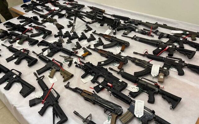 Some of the illegal weapons sezied in police raids for arms in the Arab community, November 9, 2021. (Israel Police)
