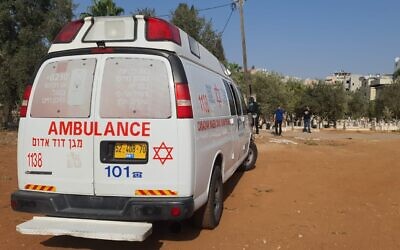 Illustrative: A Magen David Adom ambulance at the scene of a deadly shooting at a cemetery in the central town of Jaljulia, November 16, 2021. (Magen David Adom)