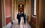 Foreign Minister Yair Lapid (L) walks with UK Foreign Secretary Liz Truss at the Foreign Office, in London, November 29, 2021. (Stuart Mitchell/ GPO)