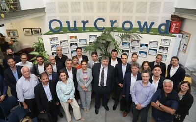 OurCrowd founder and CEO Jon Medved, center, hosts a delegation of Colombian officials and dignitaries atthe company's headquarters in Jerusalem on November 8, 2021. (courtesy)