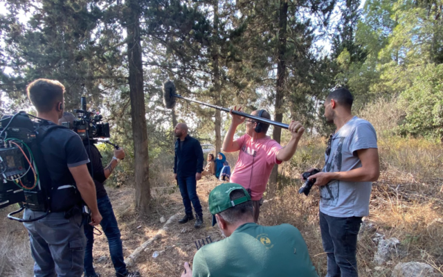 Actor and 'Fauda' co-creator Lior Raz filming the fourth season of the action drama in November 2021 (Courtesy Yes TV)
