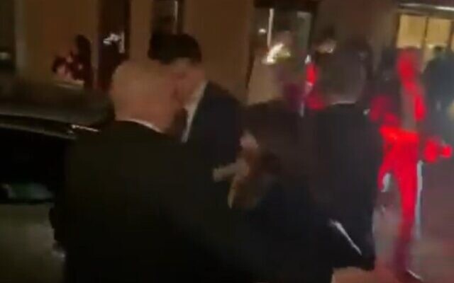 Israeli Ambassador the UK Tzipi Hotovely is seen being evacuated under heavy security from an event at the London School of Economics on Tuesday November 9 (Screencapture/Twitter)