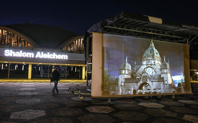 A projection of the former synagogue is seen at its historical place in Dortmund, Germany,, Nov. 9, 2021, to mark the 83rd anniversary of the anti-Jewish Kristallnacht pogrom. (AP Photo/Martin Meissner)